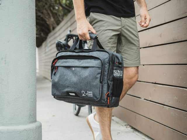 Two Wheel Gear - Pannier Briefcase Convertible 1.1 - Graphite Grey - Being Carried - On Man (1597902520355)