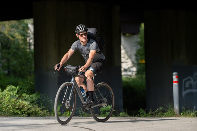 Two Wheel Gear - Handlebar Bag - Black - front of bicycle with man