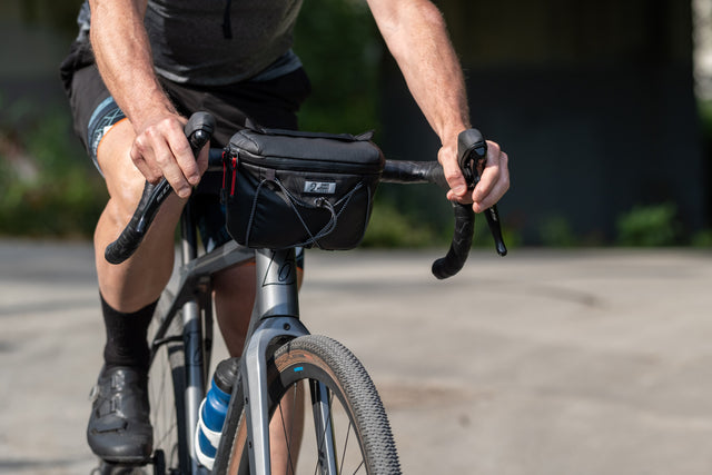 Two Wheel Gear - Handlebar Bag - Black - front of bicycle with man