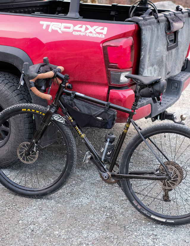Two Wheel Gear Mamquam Frame S/M on a mountain bike.